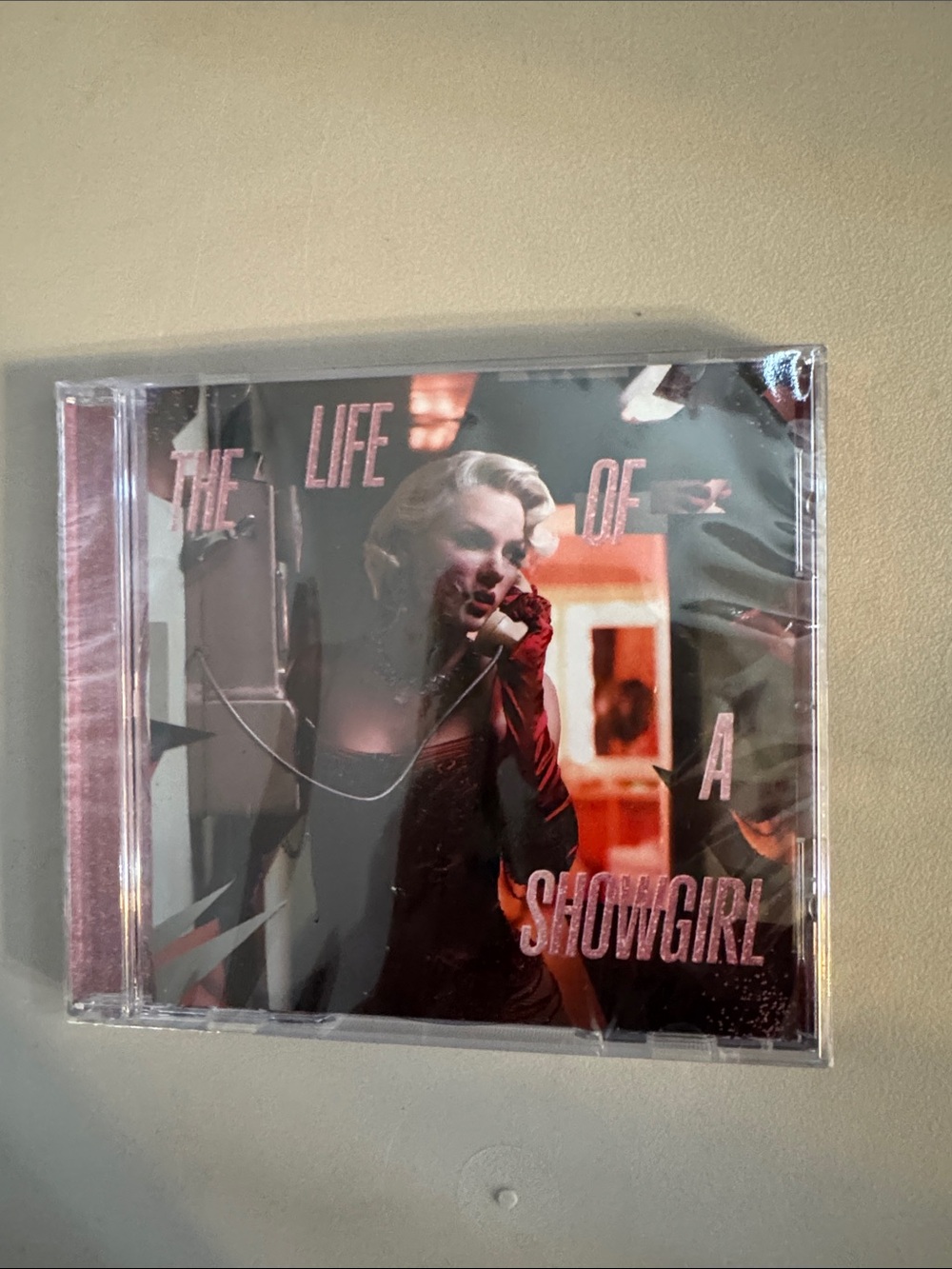 Taylor Swift CD The Life of a Showgirl Pink and Black Artwork